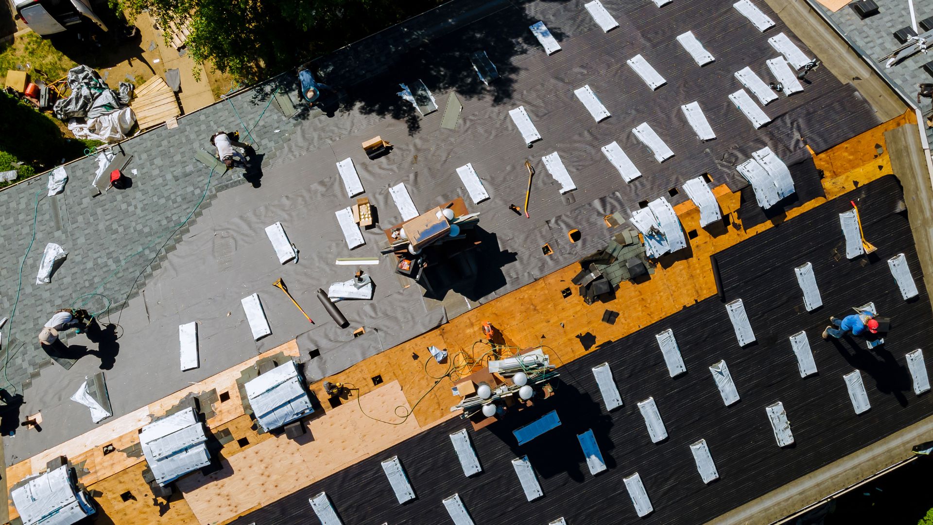 An aerial view of a parking lot with a lot of chairs